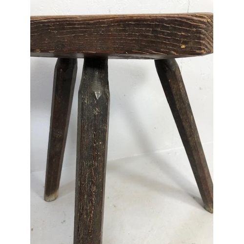 111 - Rustic oak jointed three legged stool of tall proportions approx 58cm tall