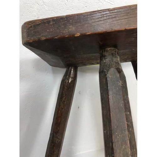 111 - Rustic oak jointed three legged stool of tall proportions approx 58cm tall