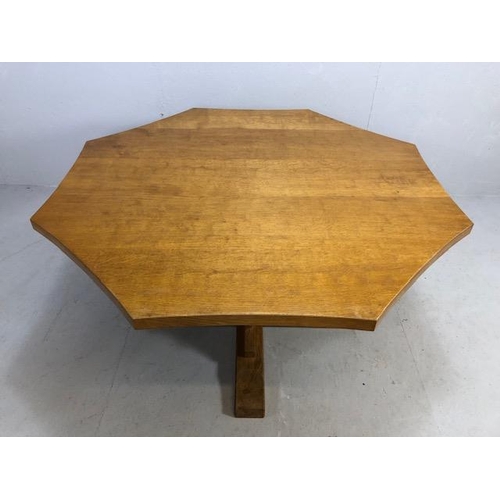 120 - Robert Mouseman Thompson (Kilburn): An English Oak Octagonal Dining Table, adzed top, on a cruciform... 