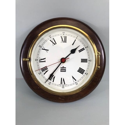 167 - Ships style clock with quartz movement mounted on a wooden plaque along with a desk model of a ships... 