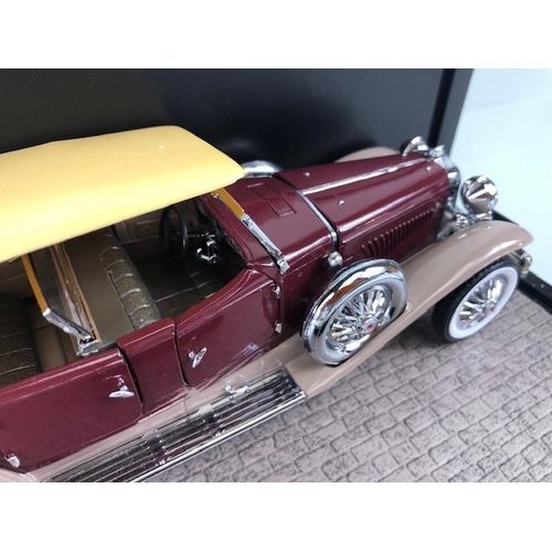 171 - Franklin mint 1987 model of a Duesenberg Tourster motor car in its display case approximately 28cm l... 