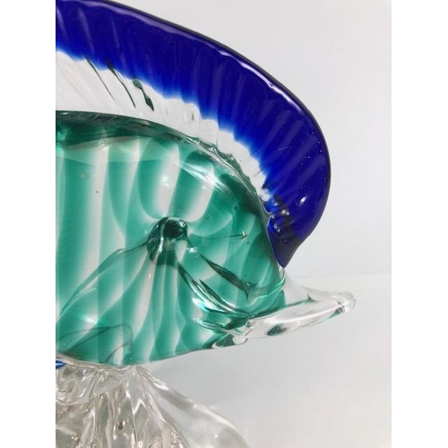 187 - Art glass, Murano glass fish on stylised swirling water in blue and sea green approximately 27cm hig... 