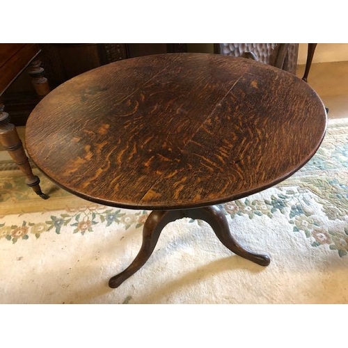 192 - Circular Oak Antique tilt top table on tripod Queen Anne feet (diameter approx 84cm)