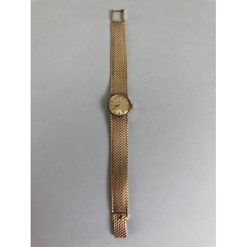 2 - OMEGA Wristwatch: 9ct Gold Omega, round faced, Gold dial with baton markers and 9ct Gold strap, tota... 