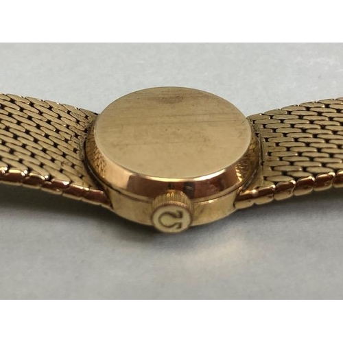 2 - OMEGA Wristwatch: 9ct Gold Omega, round faced, Gold dial with baton markers and 9ct Gold strap, tota... 