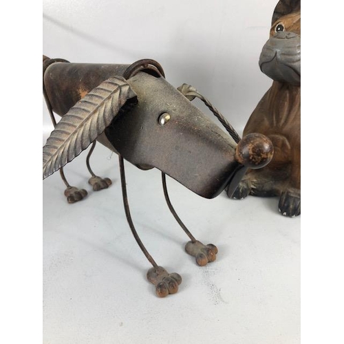 204 - Novelty dogs, one of metal approximately 15ch high  the other carved wood approximately 39cm high