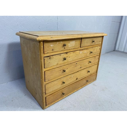 219 - Small Pine collectors cabinet of two small drawers over four long with metal stud handles approx 66 ... 