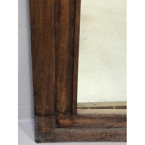 223 - Craved ecclesiastical wooden framed mirror  with a central carved rose and arched detailing approx 1... 