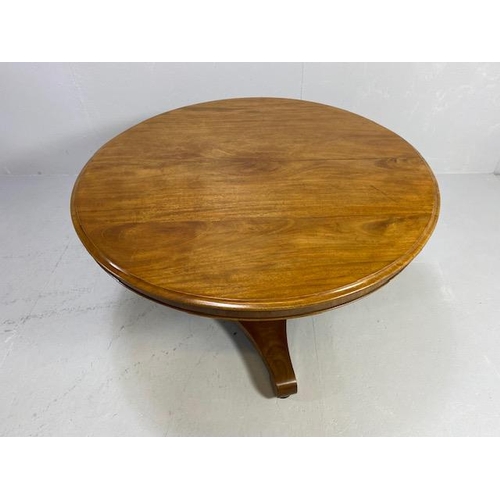 226 - Circular tilt top table on pedestal base and tripod feet, approx 106cm in diameter