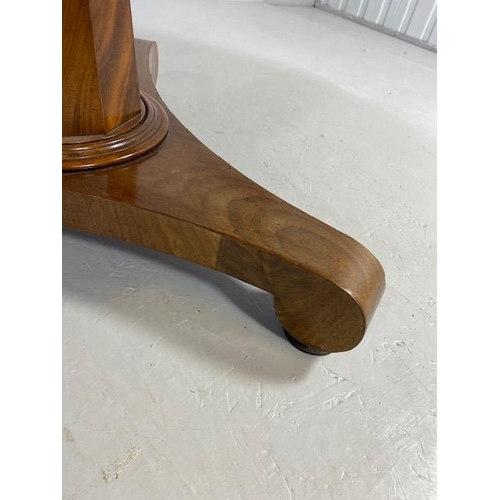 226 - Circular tilt top table on pedestal base and tripod feet, approx 106cm in diameter