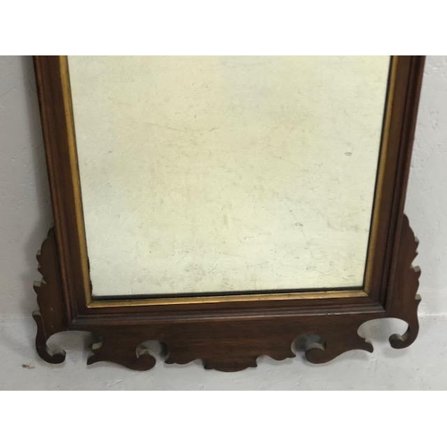 237 - Antique mirror, early 19th century mahogany framed mirror of scroll design approximately 39 x 88cm