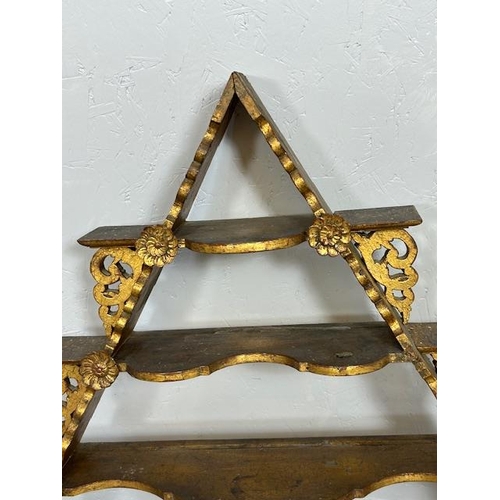 239 - Antique furniture, Austria wooden  pyramid wall mounted shelves of gilded finish approximately 77cm ... 