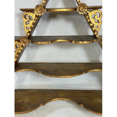 239 - Antique furniture, Austria wooden  pyramid wall mounted shelves of gilded finish approximately 77cm ... 