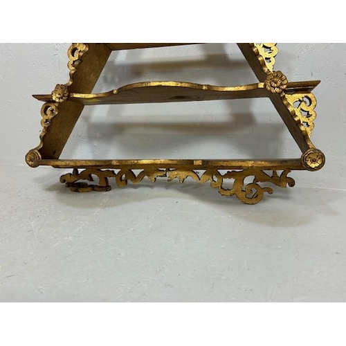 239 - Antique furniture, Austria wooden  pyramid wall mounted shelves of gilded finish approximately 77cm ... 