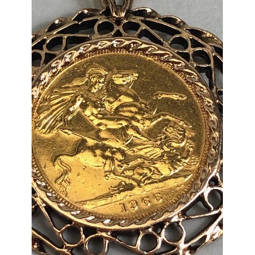 26 - 1966 GOLD SOVEREIGN in a Gold unmarked mount with a 9kt gold chain total weight approx 26.2g