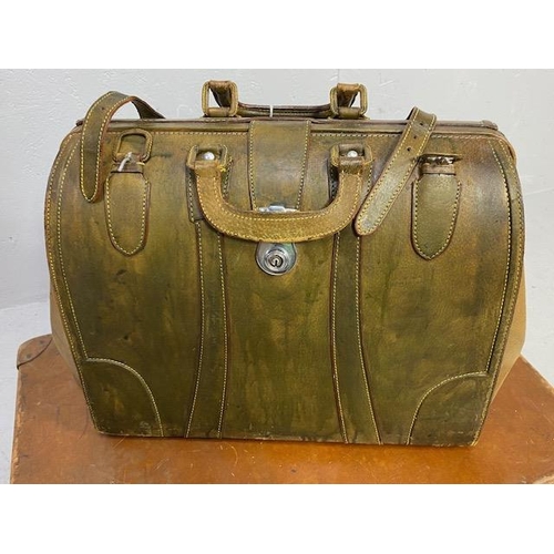 269 - Vintage luggage, modern style leather Gladstone bag and a mid century Volkan fiber suit case