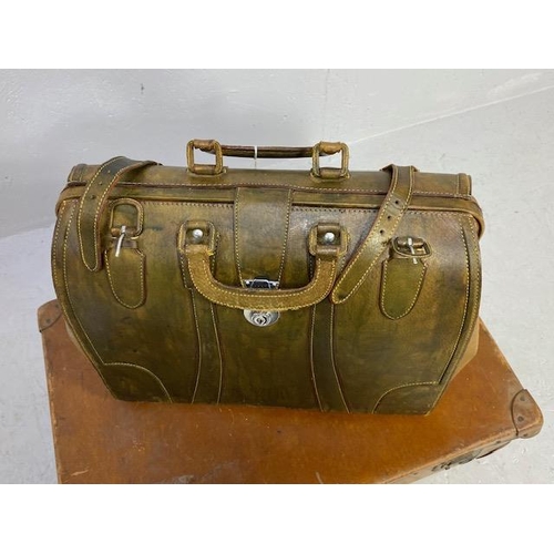 269 - Vintage luggage, modern style leather Gladstone bag and a mid century Volkan fiber suit case