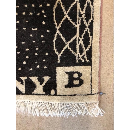 275 - Hand knotted wool rug designed as a penny black postage stamp approximately 95 x 90 cm