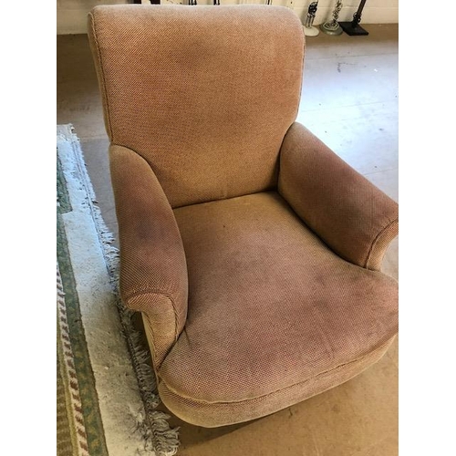 283 - Antique furniture, Howard style deep seated  arm chair, turned front legs with brass casters, has be... 