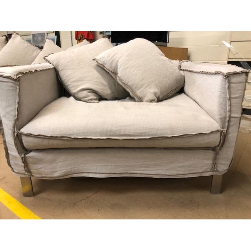 291 - Modern two seater sofa and matching arm chair by Designers Guild, with reverse  seam covers on metal... 