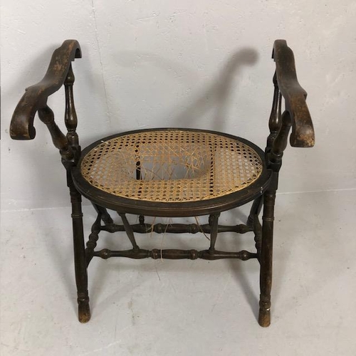 292 - Antique furniture, colonial style bathing stool  with twin handles and cane seat (damaged)