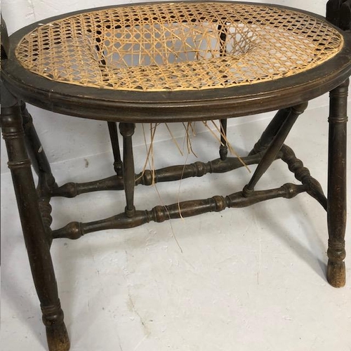 292 - Antique furniture, colonial style bathing stool  with twin handles and cane seat (damaged)