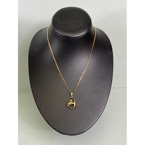 3 - 9ct Gold chain with 9ct gold pendant in the form of a Dolphin approx 10.8g