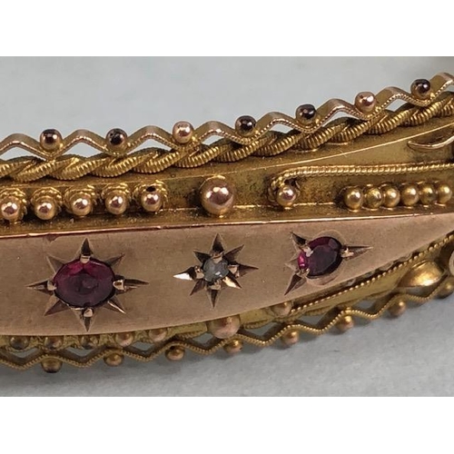 30 - Antique Jewellery: 9ct Gold marked 375 Victorian bohemian style bangle of filigree work set with thr... 