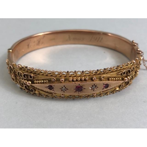 30 - Antique Jewellery: 9ct Gold marked 375 Victorian bohemian style bangle of filigree work set with thr... 