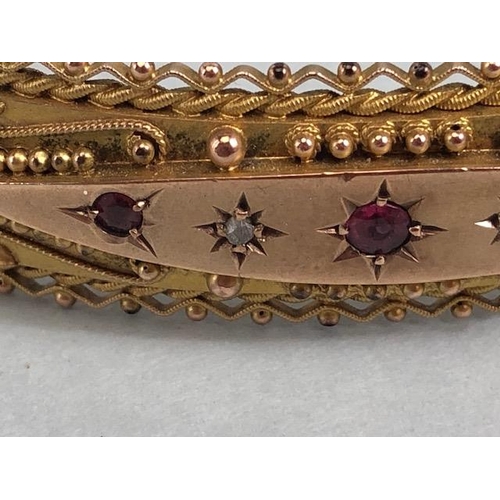 30 - Antique Jewellery: 9ct Gold marked 375 Victorian bohemian style bangle of filigree work set with thr... 