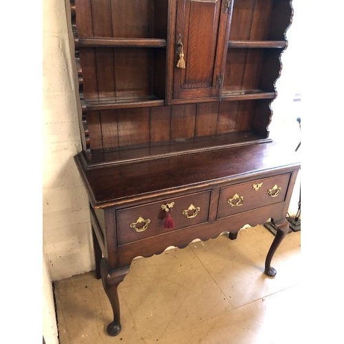 301 - Antique furniture, 19th century oak dresser, on cabriolet legs, two drawer base with three shelf top... 