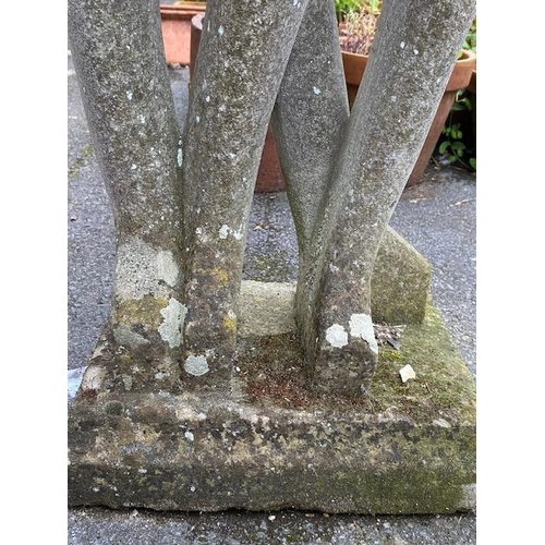 311 - Concrete garden statue in the style of Barbara Hepworth, of two figures embracing, approx 118cm tall