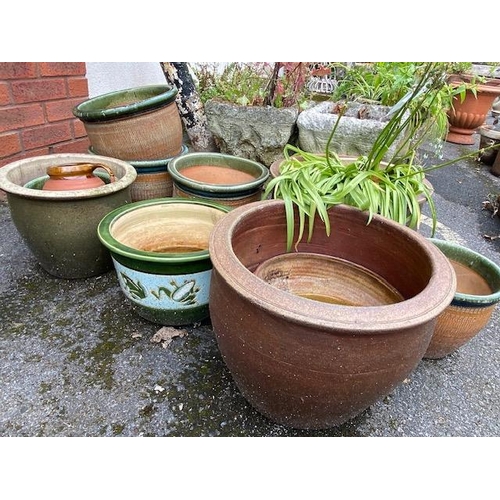 320 - Collection of garden pots to include glazed examples, approx 12