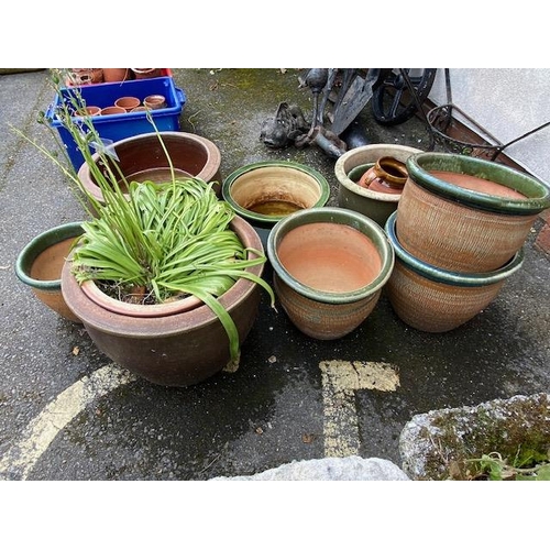 320 - Collection of garden pots to include glazed examples, approx 12