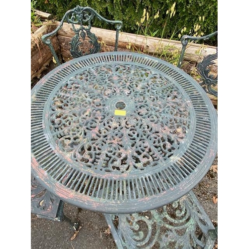 336 - Aluminium circular garden table and four chairs