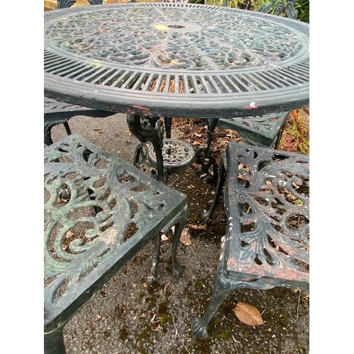 336 - Aluminium circular garden table and four chairs