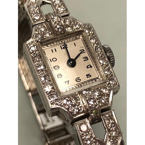 34 - 9ct white gold Art Deco design Swiss bracelet watch, with safety clasp, WHW Ltd, the case set with a... 