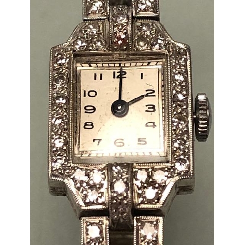 34 - 9ct white gold Art Deco design Swiss bracelet watch, with safety clasp, WHW Ltd, the case set with a... 