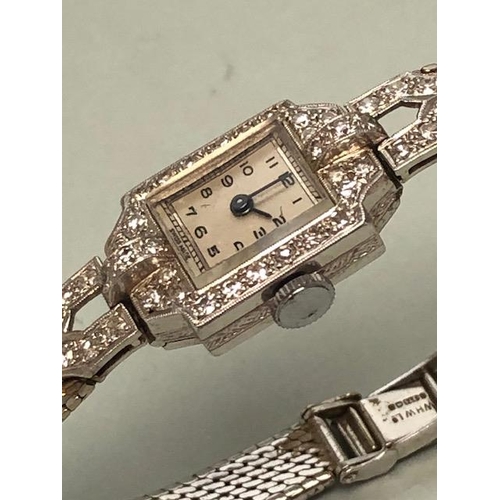 34 - 9ct white gold Art Deco design Swiss bracelet watch, with safety clasp, WHW Ltd, the case set with a... 