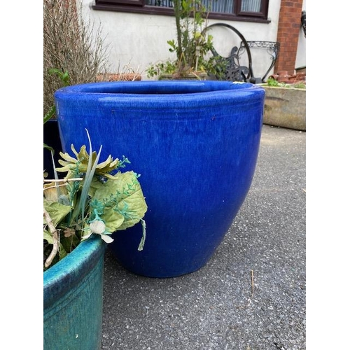 353 - Four blue glazed garden pots