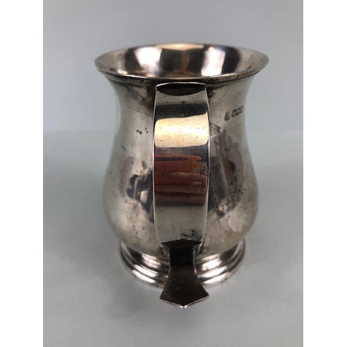 36 - Large Silver hallmarked tankard on stepped base with flared rim hallmarked for Sheffield by maker Th... 