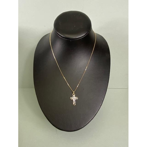 4 - 9ct Gold chain and two colour 9ct gold cross of loop design set with a single diamond to the center ... 