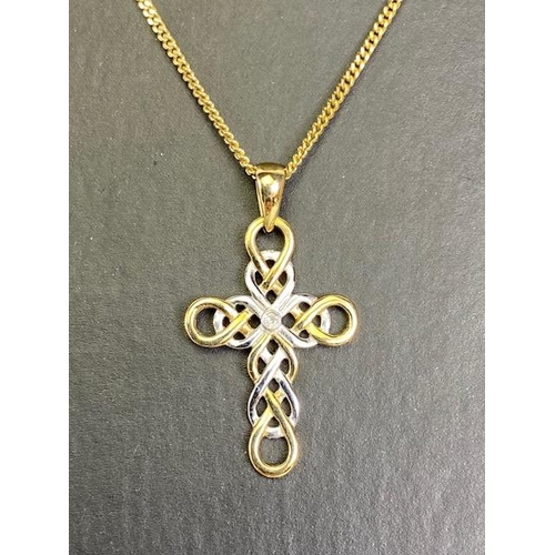 4 - 9ct Gold chain and two colour 9ct gold cross of loop design set with a single diamond to the center ... 