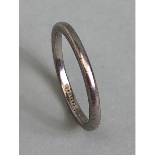 47 - Plain platinum band approximately size K and 2.7g