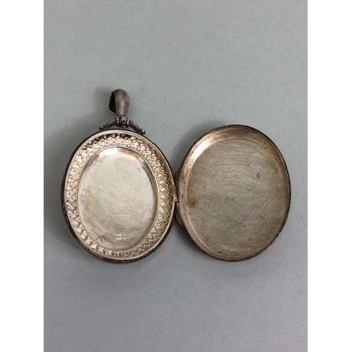 58 - Antique and Vintage silver jewellery collection to include a large oval locket with engraved design,... 