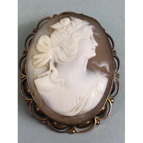 7 - Neo classical shell cameo mounted in yellow 9ct gold approximately 7.6 g total, 25mm across