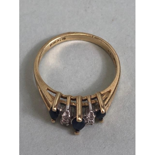 71 - Gold ring set with 3 marquise cut sapphires and 4 diamonds approximately size M and 2.3g