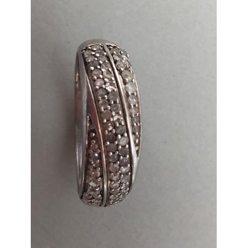 72 - Diamond pave set ring, 3 rows of round cut stones set in white metal stamped 925 G approximately siz... 