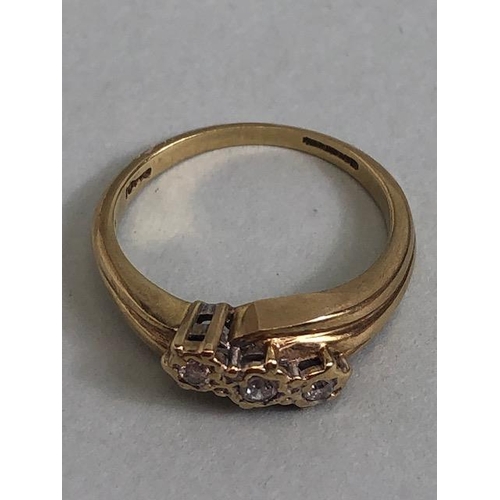 78 - 9ct gold ring set with 3 diamonds in a diagonal approximately size J and 2.2g