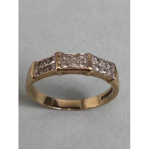 79 - 9ct gold ring set with 18 diamonds in a 3 panel setting approximately size N and 1.9g